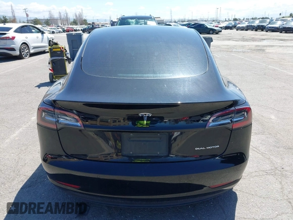 2021 Tesla Model 3 Long Range with VIN 5YJ3E1EB4MF064631, listed as a IAAI auction lot 41424856 with 95,511 mi miles and . Bid and sale history available at DreamBid. Image 16.