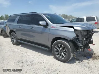2022 Chevrolet Suburban Z71 with VIN 1GNSKDKD3NR148101, listed as a Copart auction lot 52329935 with 123,112 mi miles and Salvage Title. Bid and sale history available at carsss.com. Image 4.