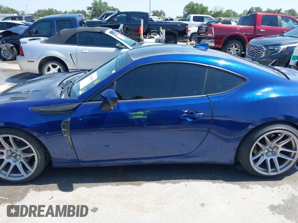 2015 Scion FR-S with VIN JF1ZNAA18F9712580, listed as a IAAI auction lot 42223595 with 157,384 mi miles and . Bid and sale history available at carsss.com. Image 14.