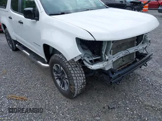 2021 Chevrolet Colorado 4WD Z71 with VIN 1GCGTDEN3M1122062, listed as a IAAI auction lot 42687632 with 52,233 mi miles and . Bid and sale history available at DreamBid. Image 18.