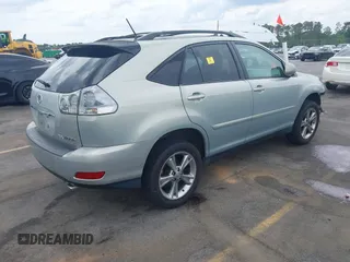 2006 Lexus RX 400h with VIN JTJHW31U462004373, listed as a IAAI auction lot 42081583 with 294,827 mi miles and . Bid and sale history available at DreamBid. Image 4.