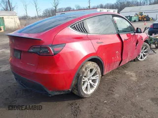 2023 Tesla Model Y Long Range with VIN 7SAYGDEE7PF672887, listed as a IAAI auction lot 41744398 with Not Provided miles. Bid and sale history available at carsss.com. Image 4.