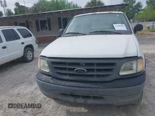 2003 Ford F-150 XL with VIN 2FTRF18W43CA95650, listed as a IAAI auction lot 42088683 with Not provided miles and . Bid and sale history available at DreamBid. Image 6.