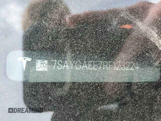 2024 Tesla Model Y Long Range z VIN 7SAYGAEE7RF123224, wystawiony jako Copart lot #58410545 z przebiegiem Nie podano mil oraz Szkoda całkowita • Salvage title. Historia ofert i sprzedaży dostępna na DreamBid. Obrazek 12.