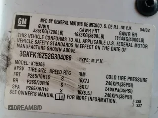 2002 GMC Yukon XL SLT z VIN 3GKFK16Z52G304086, wystawiony jako Copart lot #52407905 z przebiegiem Nie podano mil oraz Szkody całkowita. Historia ofert i sprzedaży dostępna na DreamBid. Obrazek 13.