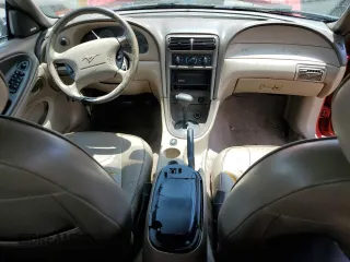 2002 Ford Mustang Deluxe z VIN 1FAFP44472F107630, wystawiony jako Copart lot #56256865 z przebiegiem 214 457 mil mil oraz Szkoda całkowita • Salvage title. Historia ofert i sprzedaży dostępna na DreamBid. Obrazek 8.