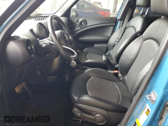 2016 MINI Countryman S with VIN WMWZC3C50GWT10905, listed as a Copart auction lot 47138895 with 59,649 mi miles and Salvage Title. Bid and sale history available at DreamBid. Image 7.