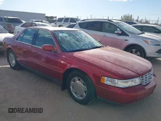 1999 Cadillac Seville Luxury SLS z VIN 1G6KS54Y8XU937328, wystawiony jako IAAI lot #41204894 z przebiegiem 282 968 mil mil oraz . Historia ofert i sprzedaży dostępna na DreamBid. Obrazek 1.