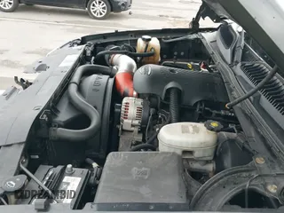 2004 Chevrolet Silverado 1500 Work Truck z VIN 1GCEK14V74Z101386, wystawiony jako IAAI lot #42155430 z przebiegiem 202 018 mil mil oraz . Historia ofert i sprzedaży dostępna na DreamBid. Obrazek 20.