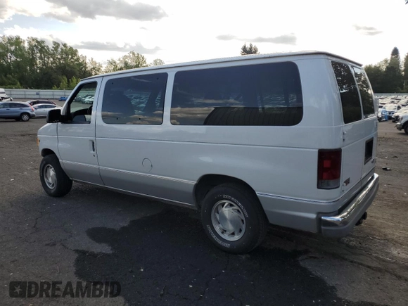 2002 Ford Econoline Passenger XL with VIN 1FMRE11WX2HA57114, listed as a Copart auction lot 68766174 with 167,382 mi miles and Salvage Title. Bid and sale history available at DreamBid. Image 2.