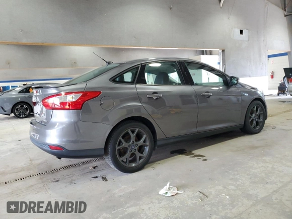 2013 Ford Focus SE with VIN 1FADP3F20DL250081, listed as a Copart auction lot 62140995 with 78,118 mi miles and Salvage title. Bid and sale history available at DreamBid. Image 3.