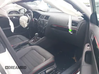 2016 Volkswagen Jetta GLI SE с VIN 3VW4T7AJ6GM413621, выставлен на аукционе IAAI как лот 42199927 с пробегом 87 696 миль миль и . История ставок и продаж доступна на DreamBid. Изображение 5.