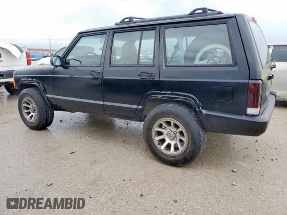 2001 Jeep Cherokee Sport with VIN 1J4FT48S41L535289, listed as a Copart auction lot 54053275 with 227,640 mi miles and Clean Title. Bid and sale history available at carsss.com. Image 3.