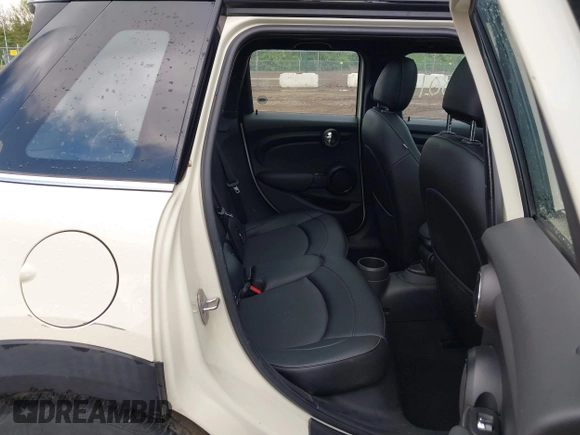 2015 MINI Hardtop 4 Door with VIN WMWXS5C52FT831291, listed as a IAAI auction lot 42179801 with 63,261 mi miles and . Bid and sale history available at DreamBid. Image 8.
