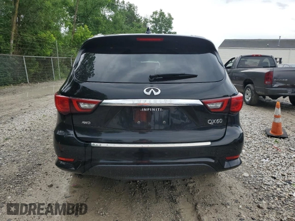 2019 Infiniti QX60 Luxe with VIN 5N1DL0MM9KC517056, listed as a Copart auction lot 62558455 with 69,808 mi miles and Clean title. Bid and sale history available at DreamBid. Image 6.