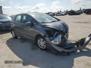 2015 Honda Fit LX с VIN 3HGGK5H59FM757797, выставлен на аукционе Copart как лот 58615175 с пробегом 109 608 миль миль и Списание • Salvage title. История ставок и продаж доступна на DreamBid. Изображение 4.