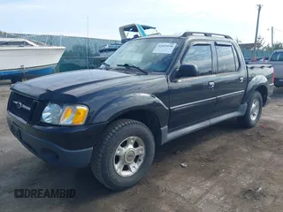 2003 Ford Explorer Sport Trac XLS z VIN 1FMZU77EX3UB99153, wystawiony jako IAAI lot #42029196 z przebiegiem Nie podano mil oraz . Historia ofert i sprzedaży dostępna na DreamBid. Obrazek 2.