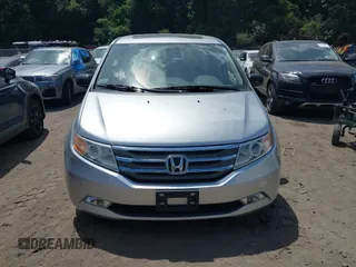 2012 Honda Odyssey Touring with VIN 5FNRL5H9XCB026741, listed as a IAAI auction lot 42808245 with 293,422 mi miles and . Bid and sale history available at DreamBid. Image 6.