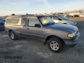 1999 Mazda B-Series 2WD Truck SE with VIN 4F4YR16V7XTM09808, listed as a Copart auction lot 87118994 with 117,698 mi miles and Clean Title. Bid and sale history available at carsss.com. Image 4.