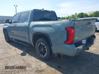 2022 Toyota Tundra SR5 with VIN 5TFLA5AB7NX013477, listed as a IAAI auction lot 42172272 with 30,460 mi miles and . Bid and sale history available at DreamBid. Image 3.