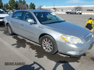 2009 Buick Lucerne CXL-4 with VIN 1G4HD57M69U114860, listed as a IAAI auction lot 41558850 with 139,252 mi miles. Bid and sale history available at carsss.com. Image 1.
