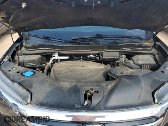 2018 Honda Pilot Elite with VIN 5FNYF6H03JB019900, listed as a Copart auction lot 57497235 with 60,358 mi miles and Salvage title. Bid and sale history available at DreamBid. Image 12.