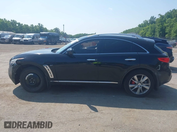 2014 Infiniti QX70 with VIN JN8CS1MW7EM410150, listed as a IAAI auction lot 39960321 with Not Provided miles and . Bid and sale history available at DreamBid. Image 14.