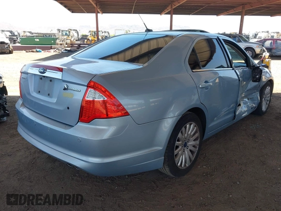 2010 Ford Fusion Hybrid with VIN 3FADP0L32AR143350, listed as a IAAI auction lot 42549839 with 137,466 mi miles and . Bid and sale history available at DreamBid. Image 4.
