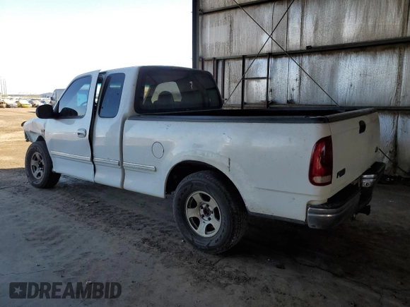1998 Ford F-150 with VIN 1FTDX176XWNA06879, listed as a Copart auction lot 46032145 with 211,308 mi miles and Salvage title. Bid and sale history available at DreamBid. Image 2.