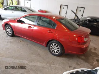 2009 Mitsubishi Galant ES z VIN 4A3AB36FX9E043141, wystawiony jako IAAI lot #42273376 z przebiegiem 242 378 mil mil oraz . Historia ofert i sprzedaży dostępna na DreamBid. Obrazek 3.