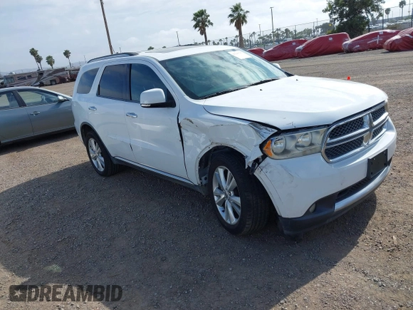 2013 Dodge Durango Crew with VIN 1C4SDHDT2DC679600, listed as a IAAI auction lot 42215737 with 128,499 mi miles and . Bid and sale history available at DreamBid. Image 1.