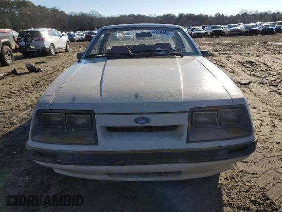 1986 Ford Mustang z VIN NOVIN42794605, wystawiony jako Copart lot #42794605 z przebiegiem 62 794 mil mil oraz Nie do naprawy • Non repairable. Historia ofert i sprzedaży dostępna na DreamBid. Obrazek 5.