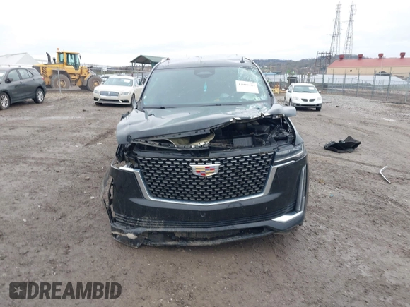 2024 Cadillac Escalade Luxury z VIN 1GYS4AKLXRR116951, wystawiony jako IAAI lot #42007285 z przebiegiem 46 101 mil mil oraz . Historia ofert i sprzedaży dostępna na DreamBid. Obrazek 13.