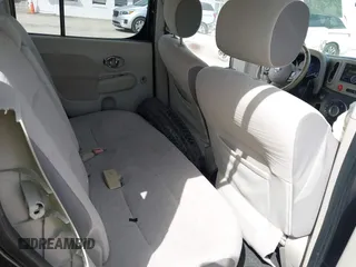 2009 Nissan Cube SL z VIN JN8AZ28R59T103584, wystawiony jako IAAI lot #41685022 z przebiegiem 158 810 mil mil oraz . Historia ofert i sprzedaży dostępna na DreamBid. Obrazek 8.