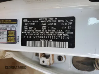 2014 Kia Optima EX z VIN 5XXGN4A71EG275210, wystawiony jako Copart lot #58095515 z przebiegiem 113 030 mil mil oraz Szkoda całkowita • Salvage title. Historia ofert i sprzedaży dostępna na DreamBid. Obrazek 12.