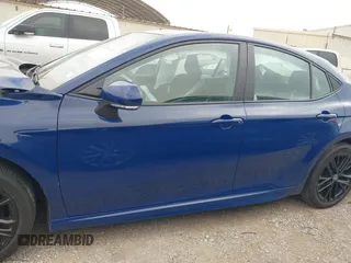 2025 Toyota Camry LE z VIN 4T1DAACK7SU034414, wystawiony jako IAAI lot #42402941 z przebiegiem 22 553 mil mil oraz . Historia ofert i sprzedaży dostępna na DreamBid. Obrazek 14.
