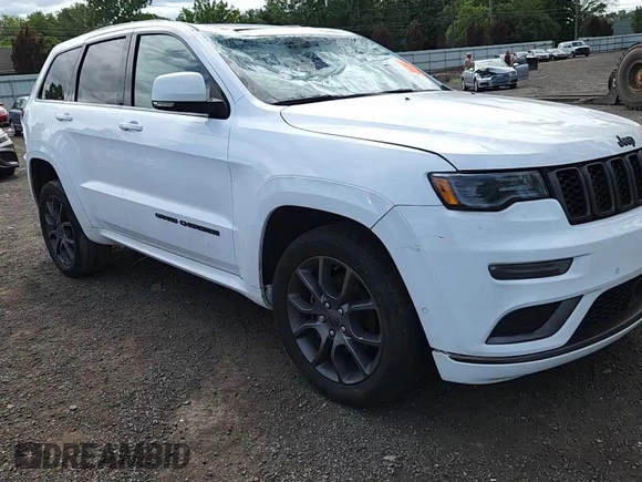 2020 Jeep Grand Cherokee High Altitude with VIN 1C4RJFCG6LC346735, listed as a Copart auction lot 64877935 with 50,258 mi miles and Salvage title. Bid and sale history available at DreamBid. Image 14.