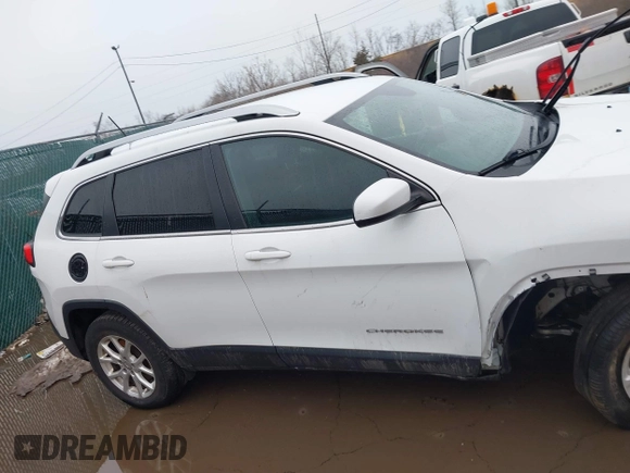 2016 Jeep Cherokee Latitude with VIN 1C4PJMCB3GW193834, listed as a IAAI auction lot 41675853 with 149,296 mi miles. Bid and sale history available at carsss.com. Image 13.