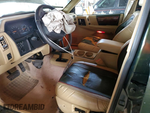 1995 Jeep Grand Cherokee Limited with VIN 1J4GZ78Y2SC723898, listed as a Copart auction lot 54142035 with 173,454 mi miles and Salvage Title. Bid and sale history available at carsss.com. Image 7.