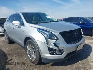 2017 Cadillac XT5 Luxury FWD z VIN 1GYKNBRS3HZ223077, wystawiony jako IAAI lot #42091584 z przebiegiem 154 664 mil mil oraz . Historia ofert i sprzedaży dostępna na DreamBid. Obrazek 1.
