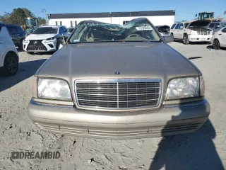 1997 Mercedes-Benz S-Class with VIN WDBGA32G5VA364471, listed as a Copart auction lot 76326464 with 0 mi miles and Salvage Title. Bid and sale history available at carsss.com. Image 5.