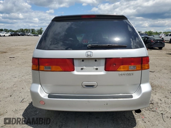 2003 Honda Odyssey EX z VIN 5FNRL186X3B075761, wystawiony jako Copart lot #58289815 z przebiegiem 137 763 mil mil oraz Szkoda całkowita • Salvage title. Historia ofert i sprzedaży dostępna na DreamBid. Obrazek 6.