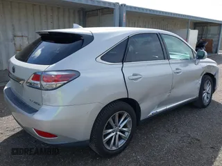 2015 Lexus RX 450h with VIN 2T2ZB1BA4FC002602, listed as a IAAI auction lot 41812562 with 166,220 mi miles and . Bid and sale history available at DreamBid. Image 4.