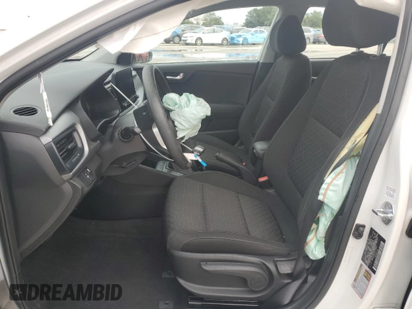 2023 Kia Rio S with VIN 3KPA24AD3PE573452, listed as a Copart auction lot 68249544 with 12,001 mi miles and Non Repairable. Bid and sale history available at DreamBid. Image 7.