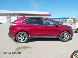 2015 Ford Edge Titanium z VIN 2FMTK3K87FBB46832, wystawiony jako IAAI lot #42358523 z przebiegiem 107 076 mil mil oraz . Historia ofert i sprzedaży dostępna na DreamBid. Obrazek 13.