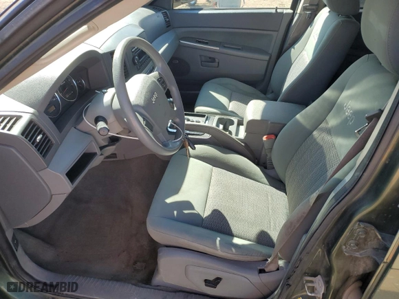 2007 Jeep Grand Cherokee Laredo with VIN 1J8GR48K57C620488, listed as a Copart auction lot 49929195 with 178,461 mi miles and Salvage Title. Bid and sale history available at carsss.com. Image 7.