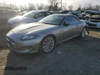 2014 Jaguar XK with VIN SAJWA4GB6ELB54454, listed as a Copart auction lot 85275384 with 53,532 mi miles and Salvage Title. Bid and sale history available at carsss.com. Image 1.