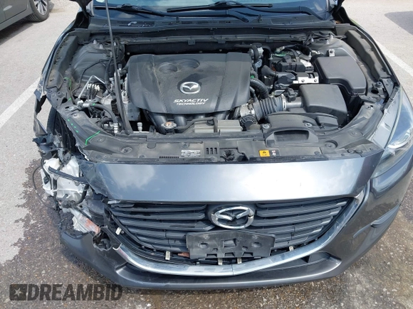 2018 Mazda 3 Touring z VIN 3MZBN1L35JM271525, wystawiony jako IAAI lot #42112552 z przebiegiem 107 299 mil mil oraz . Historia ofert i sprzedaży dostępna na DreamBid. Obrazek 10.