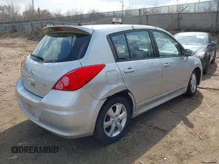2012 Nissan Versa S with VIN 3N1BC1CP2CK272290, listed as a IAAI auction lot 42030626 with 136,000 mi miles. Bid and sale history available at carsss.com. Image 4.