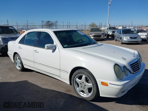 2002 Mercedes-Benz E-Class with VIN WDBJF82J62X076581, listed as a IAAI auction lot 41194976 with 235,453 mi miles. Bid and sale history available at carsss.com. Image 13.